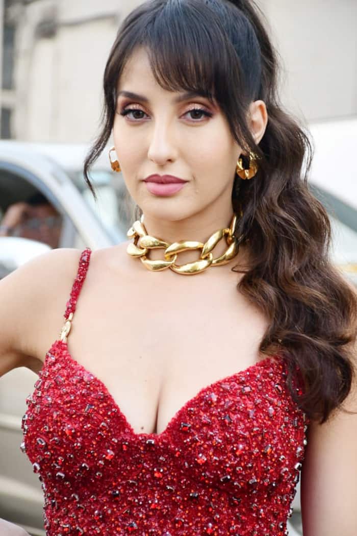 Bollywood Actress Nora Fatehi Sizzles In Red Bikini Bollywood Actress Nora Fatehi Sizzles In Red Bikini