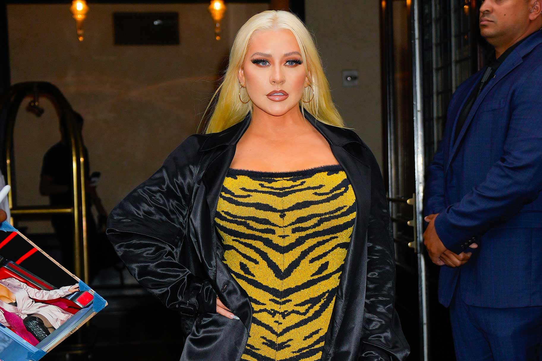 Christina Aguilera's Altered Image Sparks Online Debate: Photoshop Controversy Christina Aguilera's Altered Image Sparks Online Debate: Photoshop Controversy