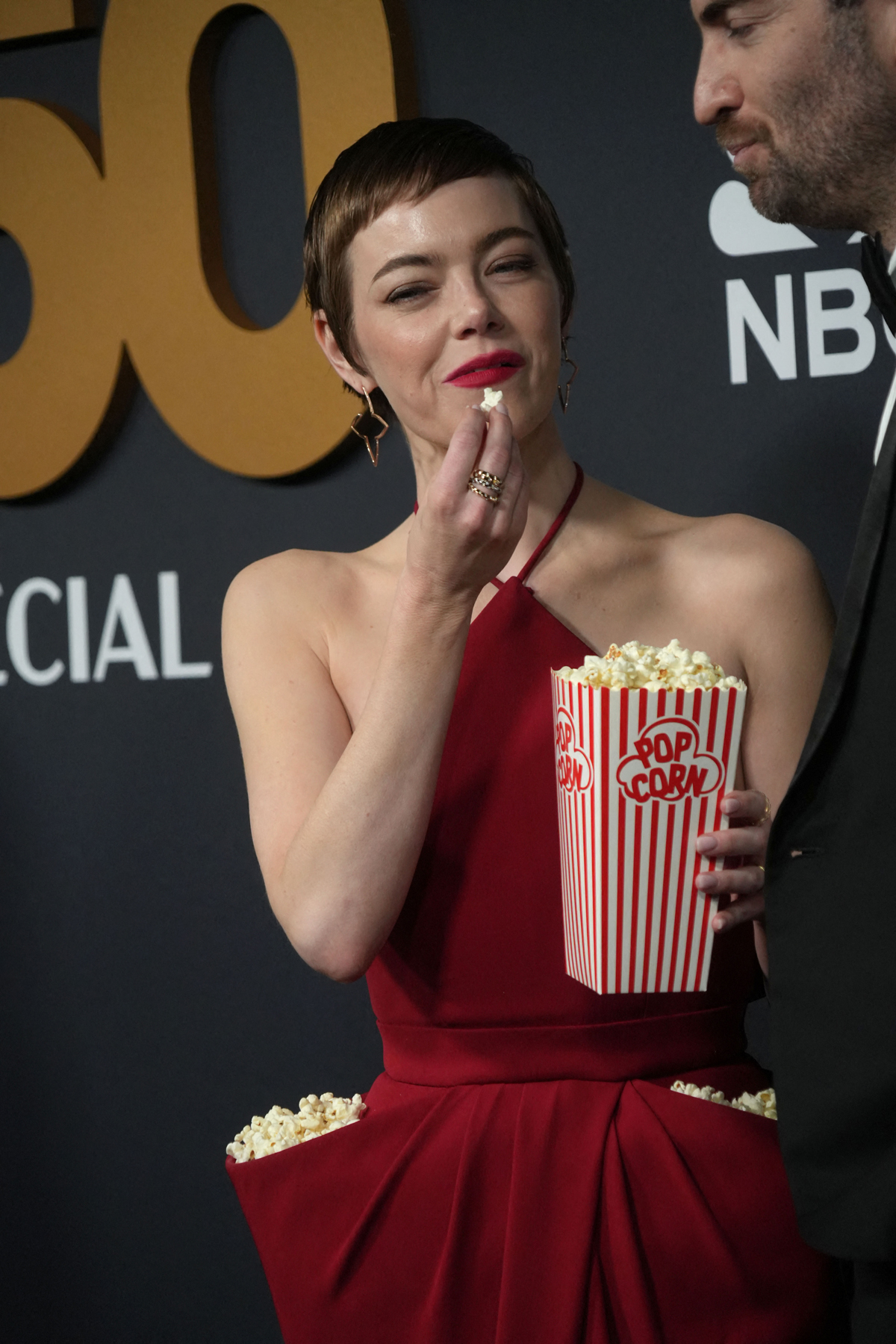 Emma Stone's Popcorn-Inspired Dress: A Viral Moment From SNL's 50th Emma Stone's Popcorn-Inspired Dress: A Viral Moment From SNL's 50th