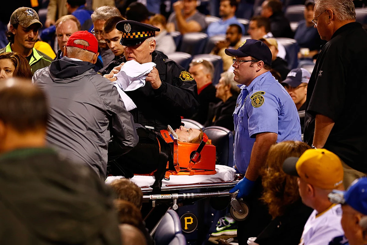 Fan's Scary Fall At Cubs-Pirates Game: Hospitalized After Outfield Wall Incident Fan's Scary Fall At Cubs-Pirates Game: Hospitalized After Outfield Wall Incident