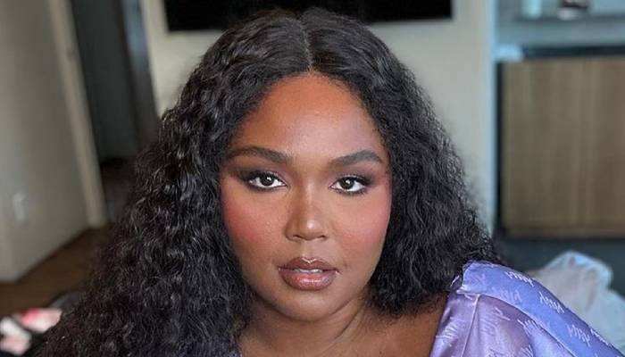 Lizzo's Trainer Defends Her Fitness Approach Lizzo's Trainer Defends Her Fitness Approach