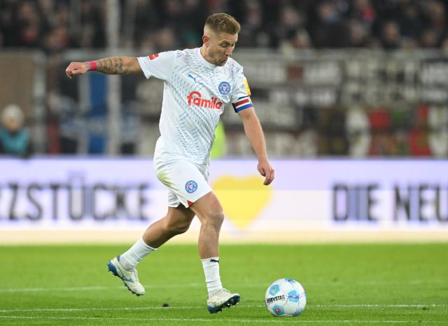Relegation Battle: Holstein Kiel Earns Crucial Draw Against Champions League-Chasing Mainz Relegation Battle: Holstein Kiel Earns Crucial Draw Against Champions League-Chasing Mainz