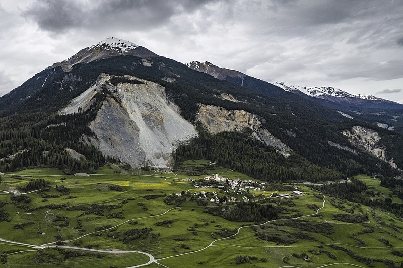 Swiss Village Faces Landslide Danger: Livestock Evacuated By Helicopter And Trail Swiss Village Faces Landslide Danger: Livestock Evacuated By Helicopter And Trail