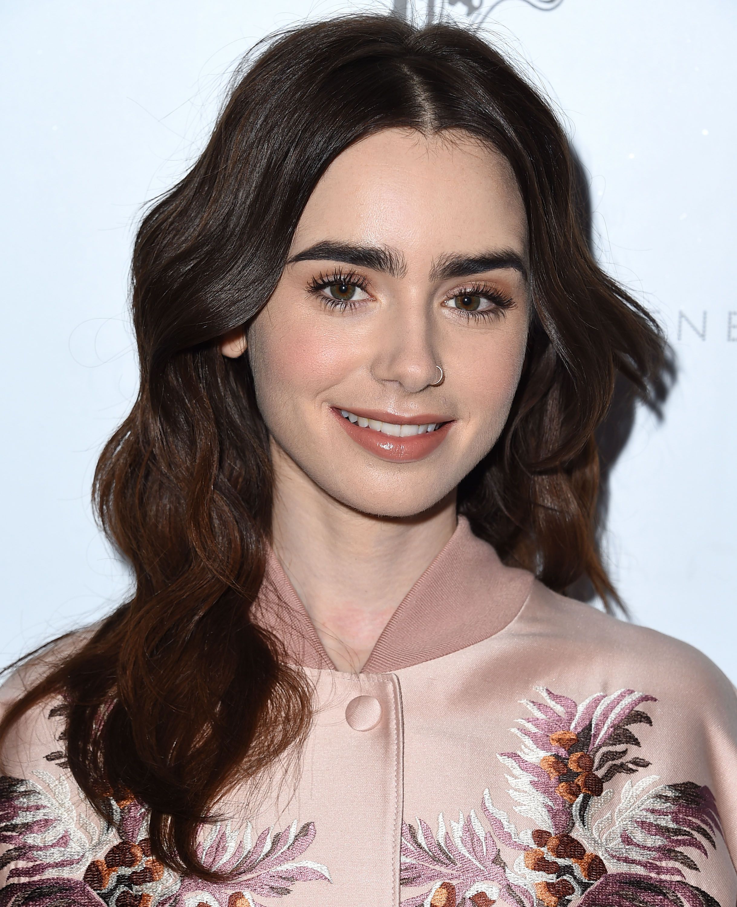 The Lily Collins Effect: Bob Hairstyle, Full Brows, And Nude Lip Trend The Lily Collins Effect: Bob Hairstyle, Full Brows, And Nude Lip Trend